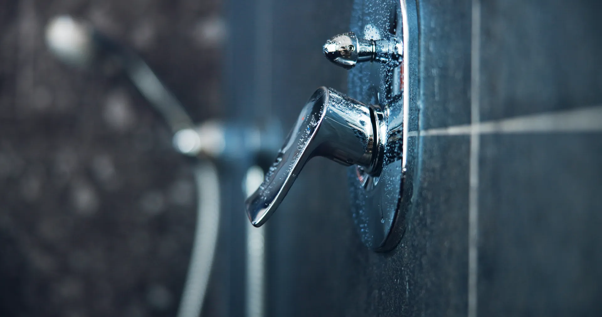 Faucet and Fixture Repair: Shower Handle and Bathroom Faucet Service Toronto GTA Close-up of shower handle and faucet being repaired by licensed plumber in Toronto GTA bathroom