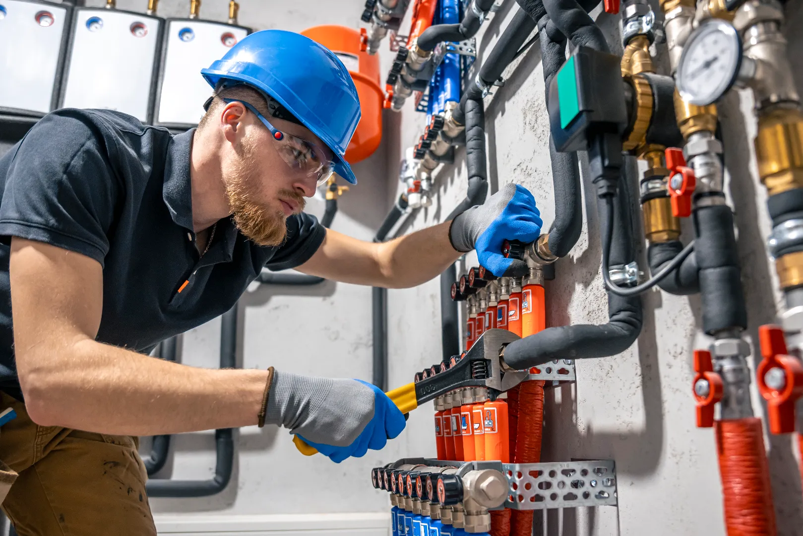 Gas Line Services — Technician Heating System Check Toronto GTA Gas technician checking heating system during professional licensed gas line services in Toronto GTA